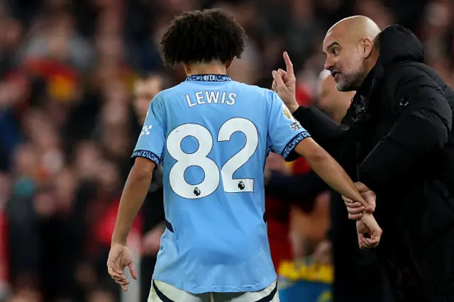 Pep Guardiola gives instructions to Manchester City's English defender #82 Rico Lewis.