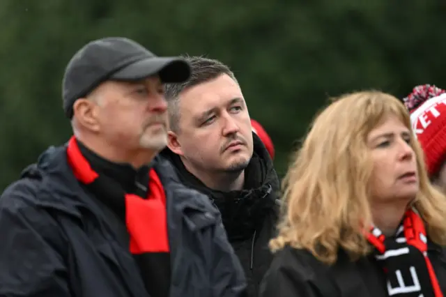 Snooker Player, Kyren Wilson looks on from the crowd during the Emirates FA Cup Second Round match between Kettering Town and Doncaster Rovers