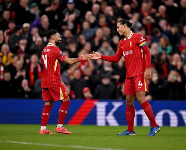 Mo Salah and Virgil Van Dijk celebrate