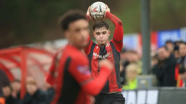 Aaron Powell of Kettering Town throws-in