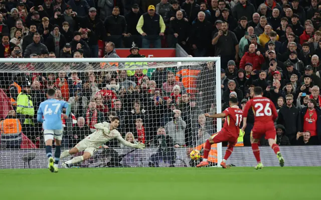 Mohamed Salah of Liverpool scores his team's second goal.