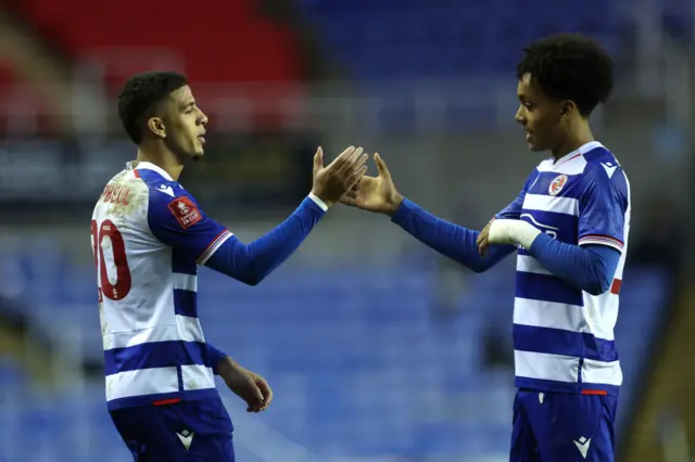 Chem Campbell of Reading celebrates scoring his second and the team's fifth goal with team-mate Andre Garcia