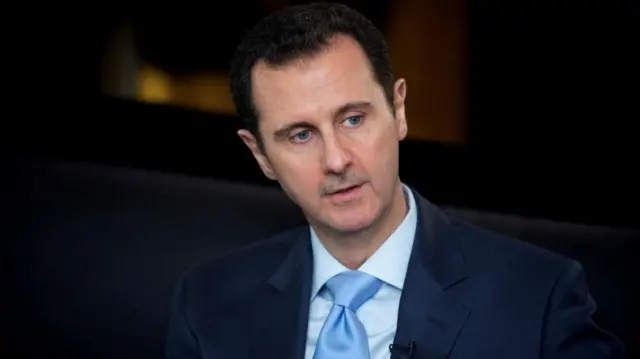 Headshot of Assad