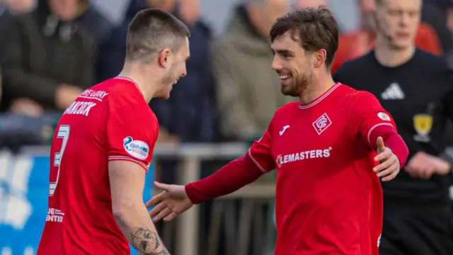 Airdrieonians' Lewis McGregor (right) celebrates