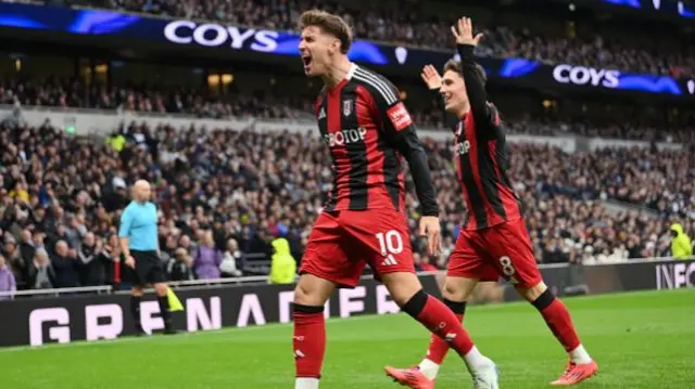 Tom Cairney celebrates.