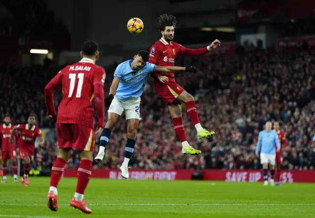 Manchester City's Matheus Nunes and Liverpool's Dominik Szoboszlai (right) battle for the ball.