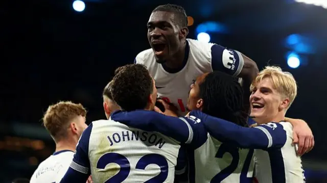 Yves Bissouma of Tottenham Hotspur celebrates the goal scored by Brennan Johnson for 0-4 during the Premier League match between Manchester City FC and Tottenham Hotspur FC.