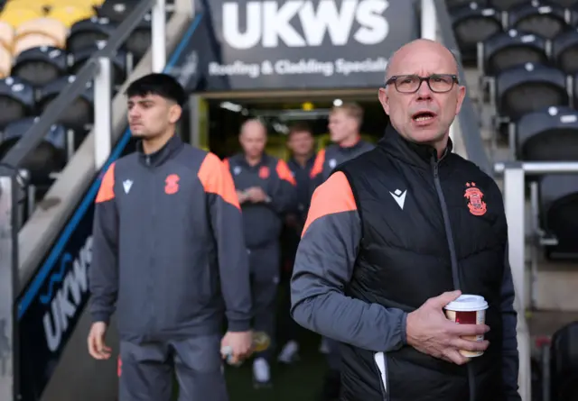 Andy Peaks, Manager of Tamworth looks on prior to the Emirates FA Cup Second Round match between Burton Albion and Tamworth at Pirelli Stadium