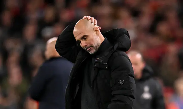 Pep Guardiola manager of Manchester City dejected.