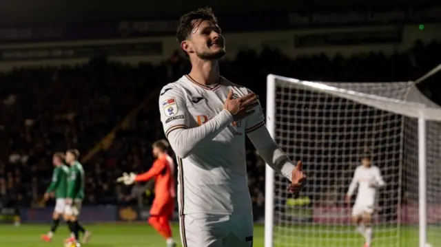 Swansea's Liam Cullen celebrates