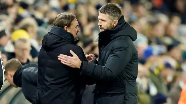 Leeds manager Daniel Farke and Boro boss Michael Carrick embrace before the game