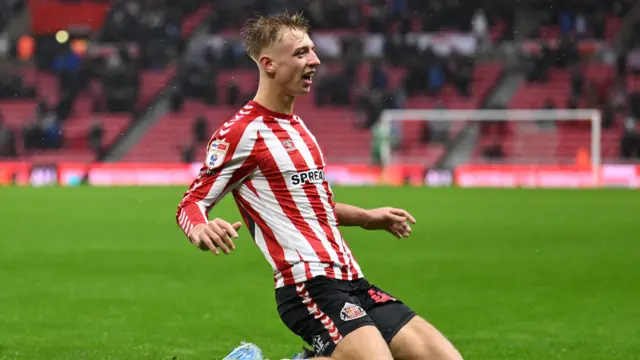 Young Sunderland talent Tommy Watson delivers a knee-slide after scoring against Stoke