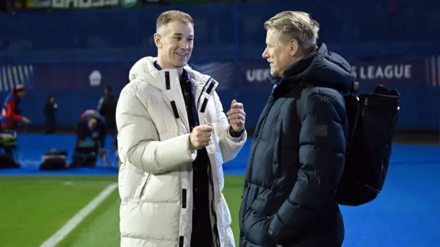 Joe Hart chats to Peter Schmeichel in Zagreb