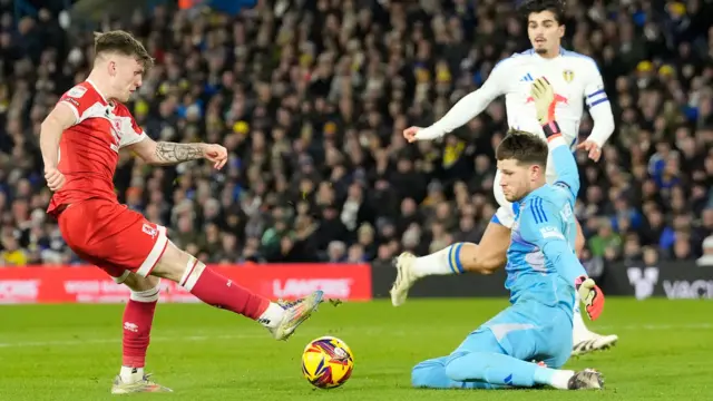 Leeds goalkeeper Illan Meslier saves from Ben Doak