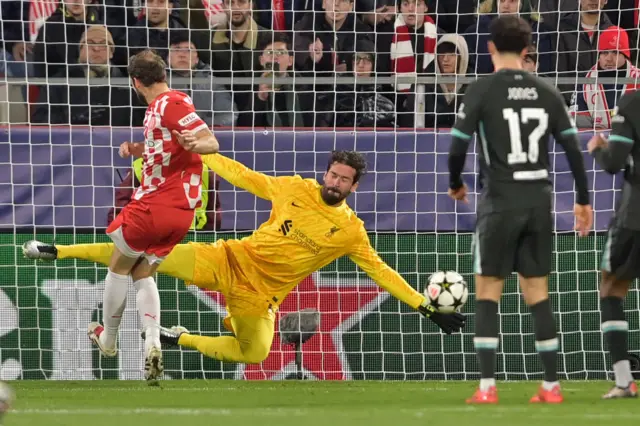 Daley Blind's shot is stopped by Liverpool's Brazilian goalkeeper #01 Alisson Becker