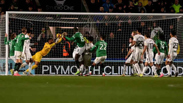 Mustapha Bundu is on hand to score for Plymouth