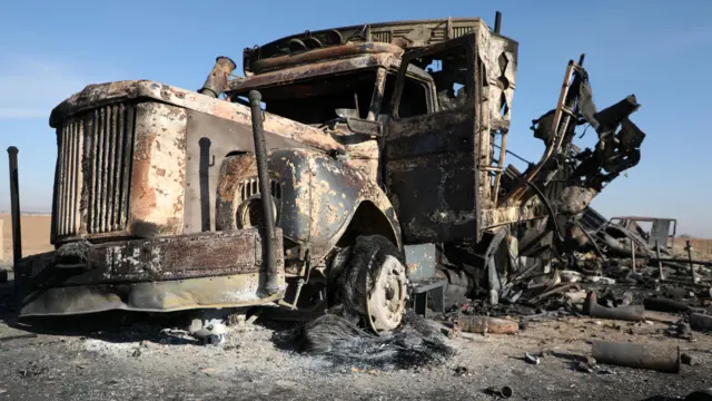 A burnt out truck near Qamishli International Airport