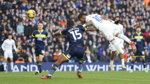 Crysencio Summerville scores a header for Leeds against Middlesbrough