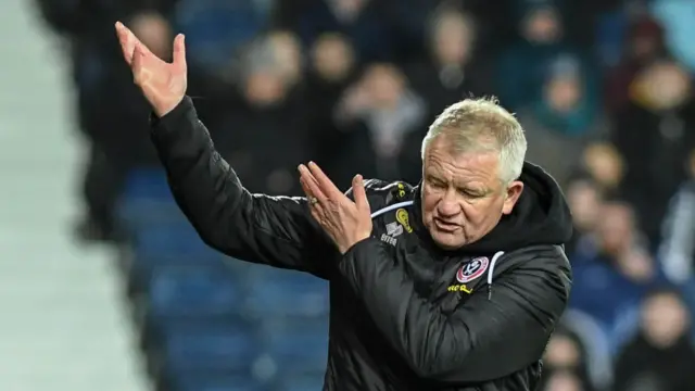 Chris Wilder gestures upwards