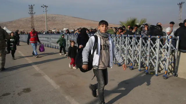 Syrian refugees residing in Turkey return to their homeland through the Cilvegözü Border Gate in Hatay on December 10, 2024 in Hatay, Turkiye.