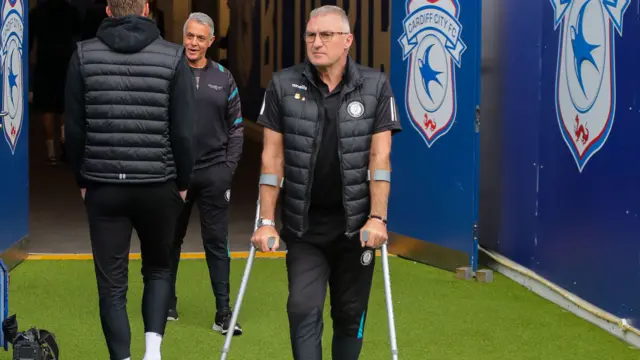 Nigel Pearson walking with crutches