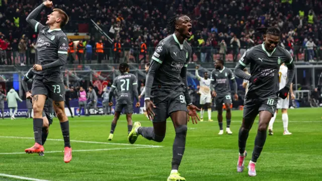 AC Milan players celebrate