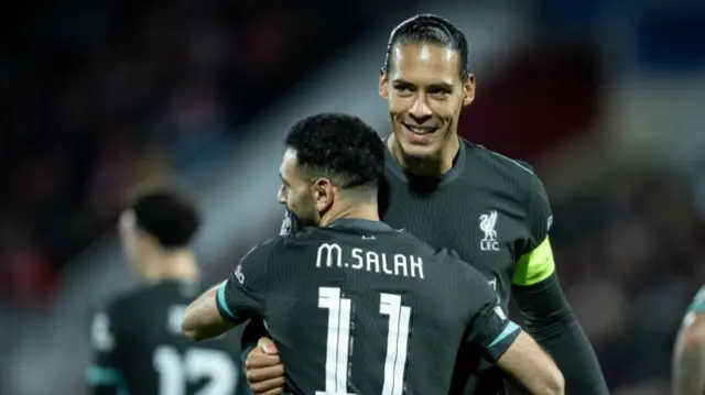 Virgil van Dijk and Mohamed Salah celebrate