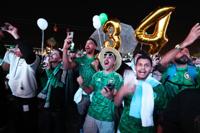 Fans in Riyadh celebrate on Wednesday