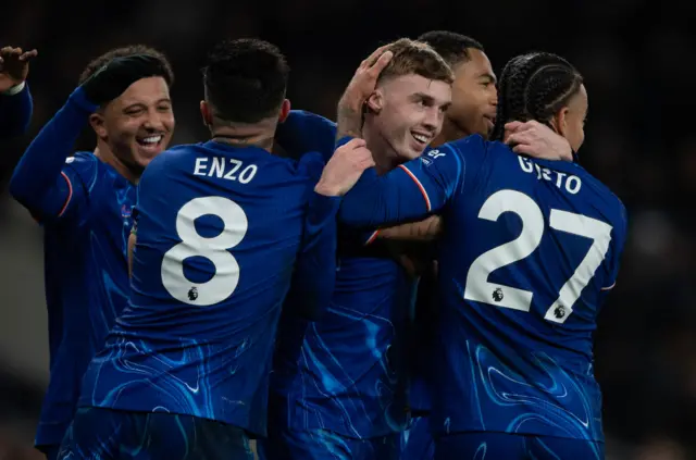 Cole Palmer congratulated by Chelsea players