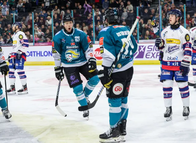 Cameron Pound celebrates after scoring for Belfast