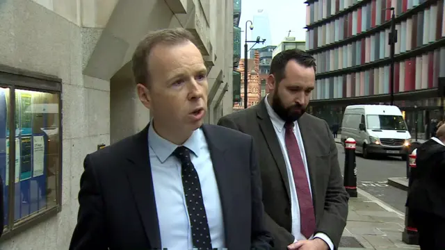 Det Ch Insp Craig Emmerson from Surrey Police addresses cameras outside court