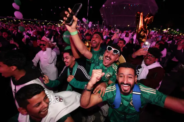 Fans in Riyadh celebrate on Wednesday