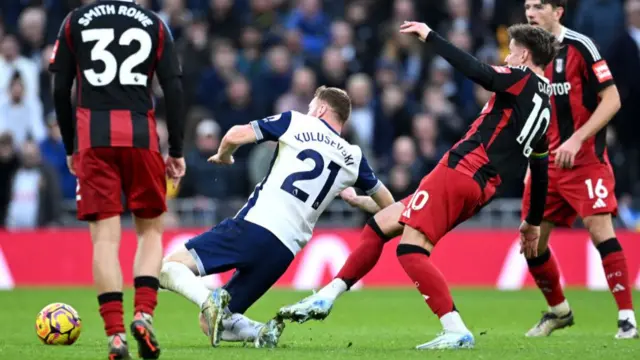 Tom Cairney is sent off for a challenge on Dejan Kulusevski