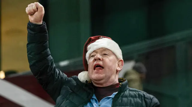 A Hearts fan with a santa hat on during a UEFA Conference League 2024/25 League Phase MD5 match between FC Copenhagen and Heart of Midlothian at Parken Stadium