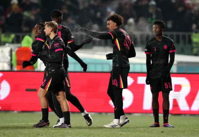 Chelsea's Renato Veiga celebrates with teammates after Marc Guiu scores their first goal