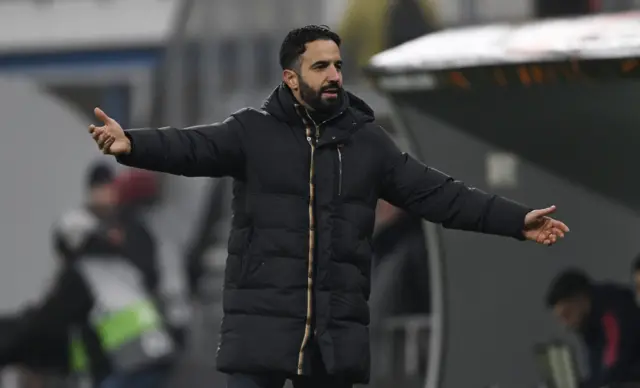 Amorim reacts in frustration, throwing his arms in the air