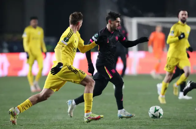 Chelsea's Pedro Neto in action with FC Astana's Yan Vorogovskiy