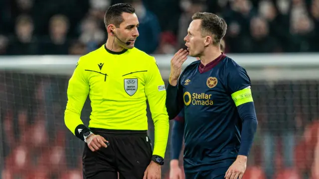 Hearts' Lawrence Shankland speaks to Referee Andrea Colombo during a UEFA Conference League 2024/25 League Phase MD5 match between FC Copenhagen and Heart of Midlothian at Parken Stadium
