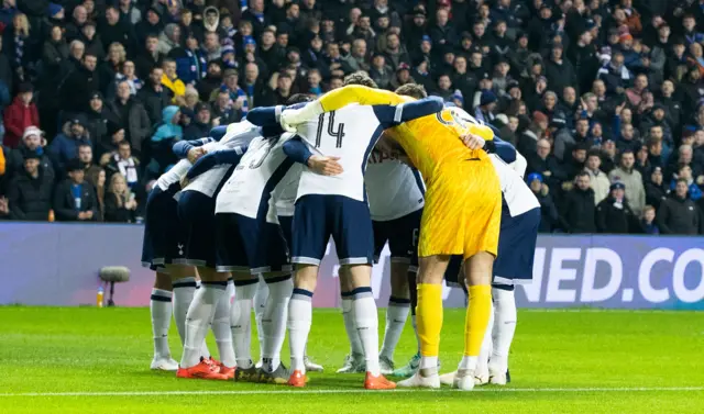 Spurs players in their pre-match huddle