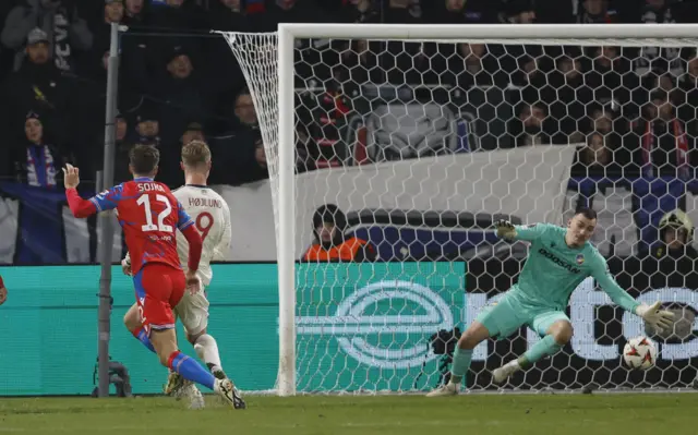 Hojlund slots home down to the left of the keeper