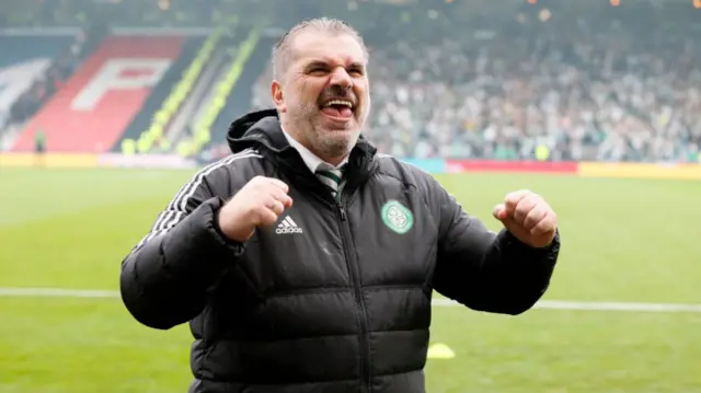 Ange Postecoglou celebrates after beating Rangers during his time at Celtic.