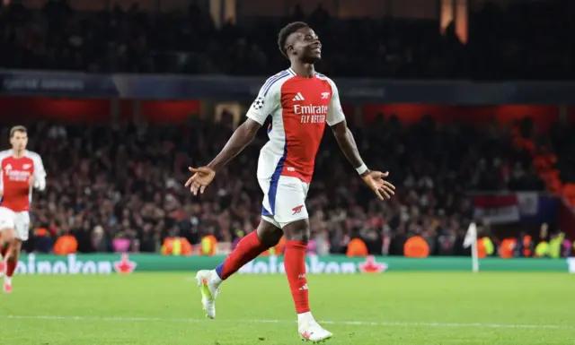 Bukayo Saka celebrates