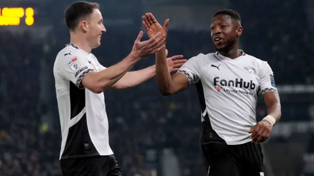 Derby celebrate scoring third goal