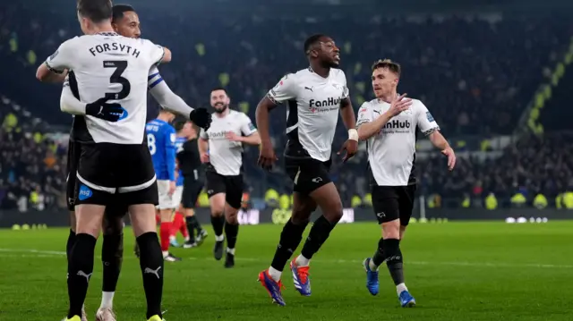 Derby celebrate scoring