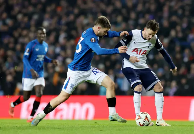 Nicolas Raskin and James Maddison battle for the ball