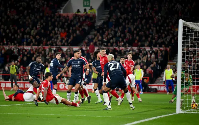 Emi Martinez save against Nottingham Forest