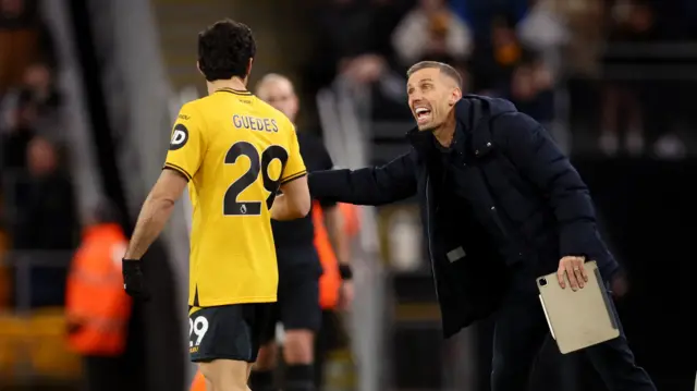 Wolverhampton Wanderers manager Gary O'Neil gives instructions to Goncalo Guedes