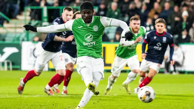 Elie Youan scores a penalty for Hibernian against Ross County