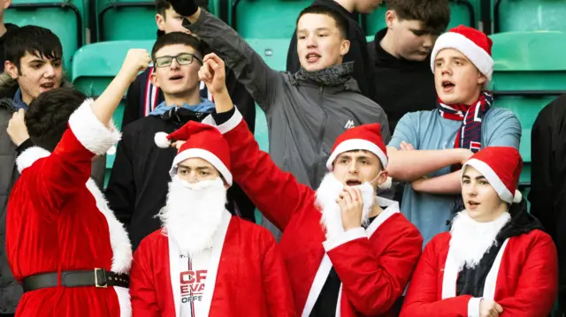 Ross County fans dressed as Santa Claus at Easter Road