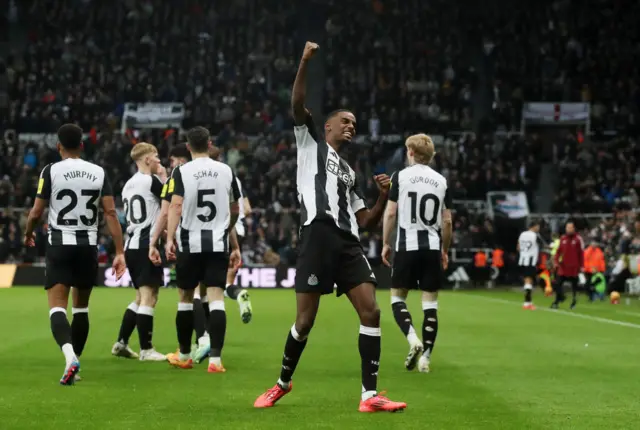 Newcastle United's Alexander Isak celebrates scoring their third goal